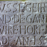 Schrifttafel und Wappenstein vom Haus Alte Münze am Kohlmarkt 16