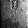 Detail zur Grabinschrift für Johann Kaidler auf der Grabplatte für den Geistlichen Huebinger (Nr. 180), an der Südwand neben den Altarstufen. Zweitverwendung der Platte.