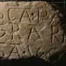 Fragment eines Inschriftensteines.