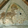 Bildbeischrift und der Stier des Lukas in der westlichen Gewölbekappe des Chors.