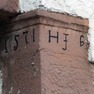 Jahreszahl und Wappen in der Wand des Hauses; Lammgasse 6 