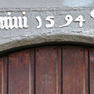 Hoher Weg 1, Fachwerkhaus "Kulkmühle", Türsturz (1594)
