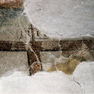 Bild zur Katalognummer 127: stark zerstörter Teil einer Wandmalerei mit Titulus