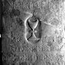 Grabinschrift für Johann Kaidler auf der Grabplatte für den Geistlichen Huebinger (Nr. 180), an der Südwand neben den Altarstufen. Zweitverwendung der Platte.