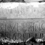 Verschollenes Fragment einer Grabplatte mit Inschrift, die bei einer Zweitverwendung angebracht wurde.