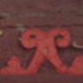 Türsturz mit vertieftem Feld und farbiger Inschrift in zwei  Zeilen.