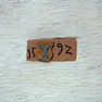 Jahreszahl und Wappen auf in Hauswand eingelassenem Stein, Schloßsteige 2 (1592) 