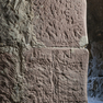 Sandsteinquader mit Namen und weiteren Inschriften