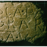 Fragment eines Inschriftensteines.